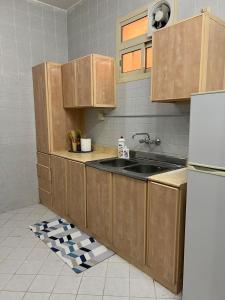 Η κουζίνα ή μικρή κουζίνα στο Al Daar Apartments