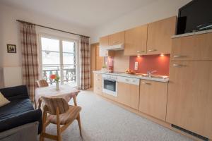 Kuchyň nebo kuchyňský kout v ubytování Ferienwohnung Pension Tirol