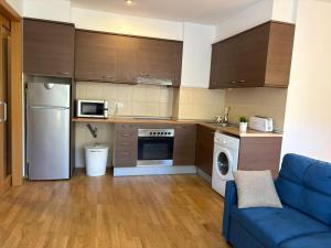 Dapur atau dapur kecil di Apartamento confortable y espacioso Aüt 2