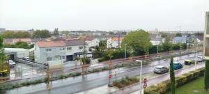 a view of a city with cars on a highway at Studio calme in Saint-Nazaire