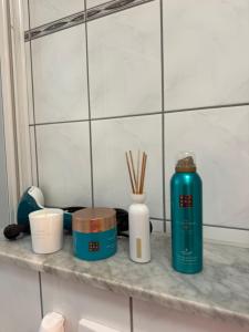 a counter with a bottle and other items on it at Retro Style in Erfurt in Erfurt