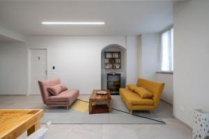 Ruang duduk di Le finestre sul Lago - Lake Como Front - Free Parking and AC