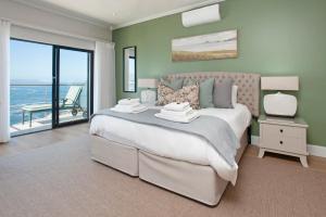 Postel nebo postele na pokoji v ubytování Hamewith Penthouse