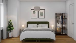 Un dormitorio con una cama con cabecero verde. en The R Apartment Farnsberg, en Basilea