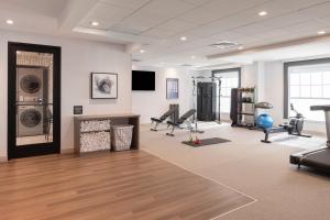 a gym with treadmills and cardio equipment in a room at Home2 Suites By Hilton Kittery in Kittery