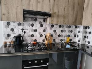 Η κουζίνα ή μικρή κουζίνα στο Kerryhomes +3 φωτογραφίες
