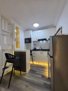 Η κουζίνα ή μικρή κουζίνα στο Mira haven apartment