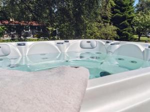 a jacuzzi bathtub with aceanographer at Holiday Home Thorlak - 860m from the sea by Interhome in Marielyst