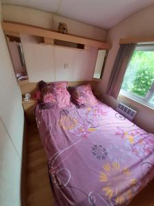 Ένα ή περισσότερα κρεβάτια σε δωμάτιο στο Mobil Home Merlimont