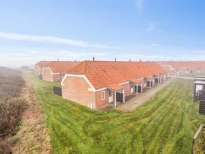 an aerial view of a row of brick houses at Holiday Home Ubbe - 200m from the sea by Interhome in Lemvig