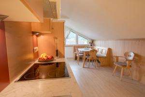 Kuchyň nebo kuchyňský kout v ubytování Ferienwohnung Pension Tirol