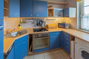 Kuchyň nebo kuchyňský kout v ubytování 3 Kluntjes + 10 fotografií