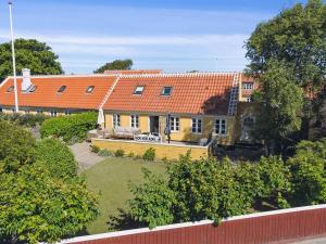 an aerial view of a house with an orange roof at Holiday Home Algeth - 200m from the sea by Interhome in Skagen