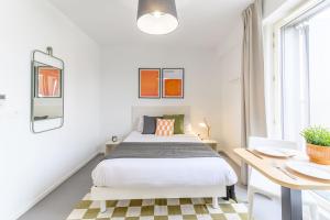 Ένα ή περισσότερα κρεβάτια σε δωμάτιο στο Student Factory Paris - Saint-Denis - Universeine
