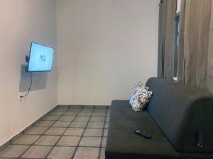 TV a/nebo společenská místnost v ubytování Casa Joaninha Biasutti