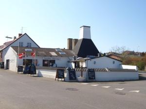 a building on the side of a street at Holiday Home Elvira - 300m from the sea by Interhome in Svaneke