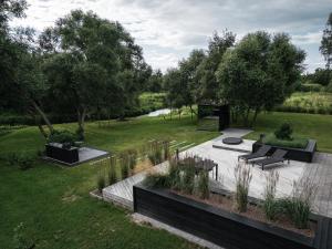 an overhead view of a garden with benches and trees at Watermill Resort in Leebiku +28 photos