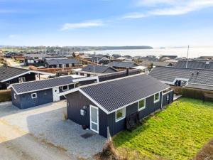 an aerial view of a row of houses at Holiday Home Gyrid - 150m from the sea by Interhome in Rønde