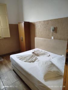 Ένα ή περισσότερα κρεβάτια σε δωμάτιο στο Hotel Hilton