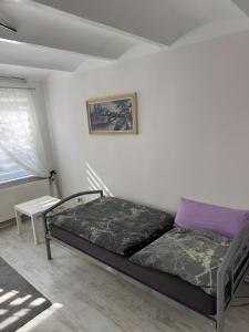 Ένα ή περισσότερα κρεβάτια σε δωμάτιο στο Ferienwohnung Rothentor2