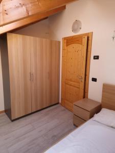 Postel nebo postele na pokoji v ubytování Cesa Pegghy