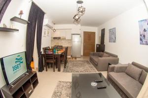 Χώρος καθιστικού στο Luxury chalet in Marina Marassi Marina view