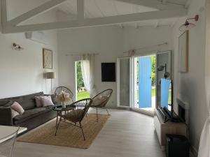 TV a/nebo společenská místnost v ubytování Jolie maison familiale