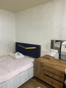 Postel nebo postele na pokoji v ubytování mamuhouse
