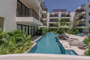 Πισίνα στο ή κοντά στο Boho Breeze at Costa Caribe