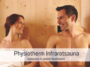 a man and a woman sitting in a bathroom at Apartments Tannheim - Ruhige Apartments mit Infrarotsauna & Sommerbergbahnen inklusive in Tannheim +67 photos