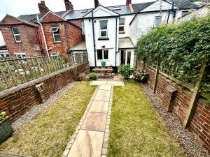 Κήπος έξω από το Nomi Homes - Okehampton Place - Exeter - Sleeps 7 +11 φωτογραφίες