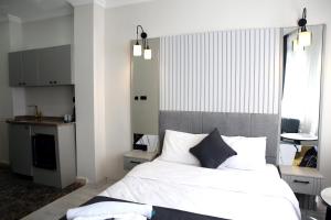 Postel nebo postele na pokoji v ubytování Mar Blanco Hotel + 2 fotografie