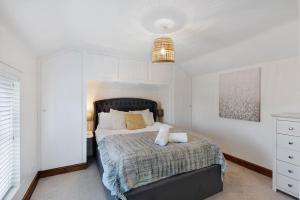 Voodi või voodid majutusasutuse Seven Space - Pilgrims Rest, Cottage in Bacton toas