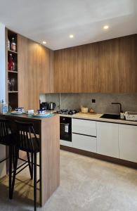 Η κουζίνα ή μικρή κουζίνα στο Appartement S1 Luxueux