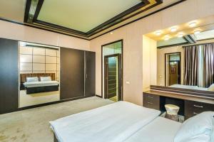 Ένα ή περισσότερα κρεβάτια σε δωμάτιο στο City Center Apartments +21 φωτογραφίες