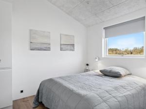 Katil atau katil-katil dalam bilik di Holiday Home Fridhild - 1-5km from the sea by Interhome