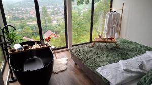 Postel nebo postele na pokoji v ubytování Panoramic Box