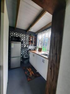 Kuchyň nebo kuchyňský kout v ubytování Stone Cottage