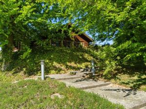 a house on top of a hill with stairs at Holiday Home Nantje - 560m to the inlet by Interhome in Jægerspris +24 photos