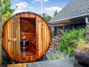 a wooden iguanauanauanauanauanauanauanauanauanauanauanauanauana at Holiday Home Solfrid - 150m from the sea by Interhome in Esbjerg