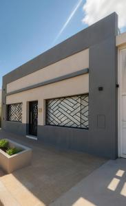 a rendering of a modern house at Altos 679inn in Comodoro Rivadavia +24 photos