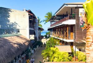 a view of a street in a city with buildings at Suites by Eco Hotels in El Nido