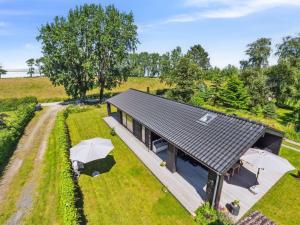 an overhead view of a house with a roof at Holiday Home Huldrik - 100m from the sea by Interhome in Martofte