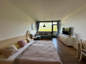 Ένα ή περισσότερα κρεβάτια σε δωμάτιο στο Steinbock Apartement