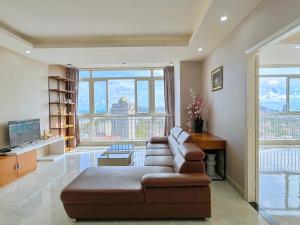 Μια τηλεόραση ή/και κέντρο ψυχαγωγίας στο Nice Apartment in Vũng Tàu building Oasky