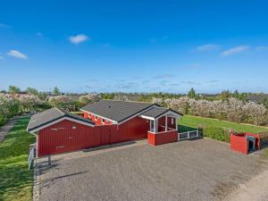 an overhead view of a red barn at Holiday Home Seba - 1km to the fjord by Interhome in Hemmet +23 photos