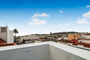 a view of a city from the roof of a building at Casa Bonita Peaceful Home in Ingenio