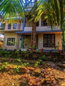 Κήπος έξω από το IDAM Homestay Ponmudi