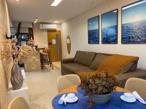 Χώρος καθιστικού στο Lindo Apartamento em Guarajuba Proximo a Praia
