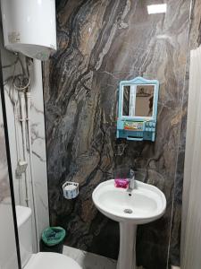 Ένα μπάνιο στο Guest House "Asia"